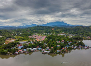 Scenic view of mountains and lake against sky