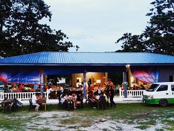 People in front of building