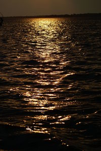 Scenic view of sea against sky at sunset