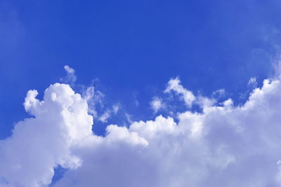 Low angle view of clouds in blue sky