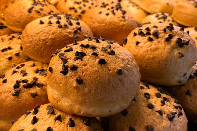 Chocolate chip bread buns in a wicker basket