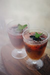 Close-up of drink in glasses on table