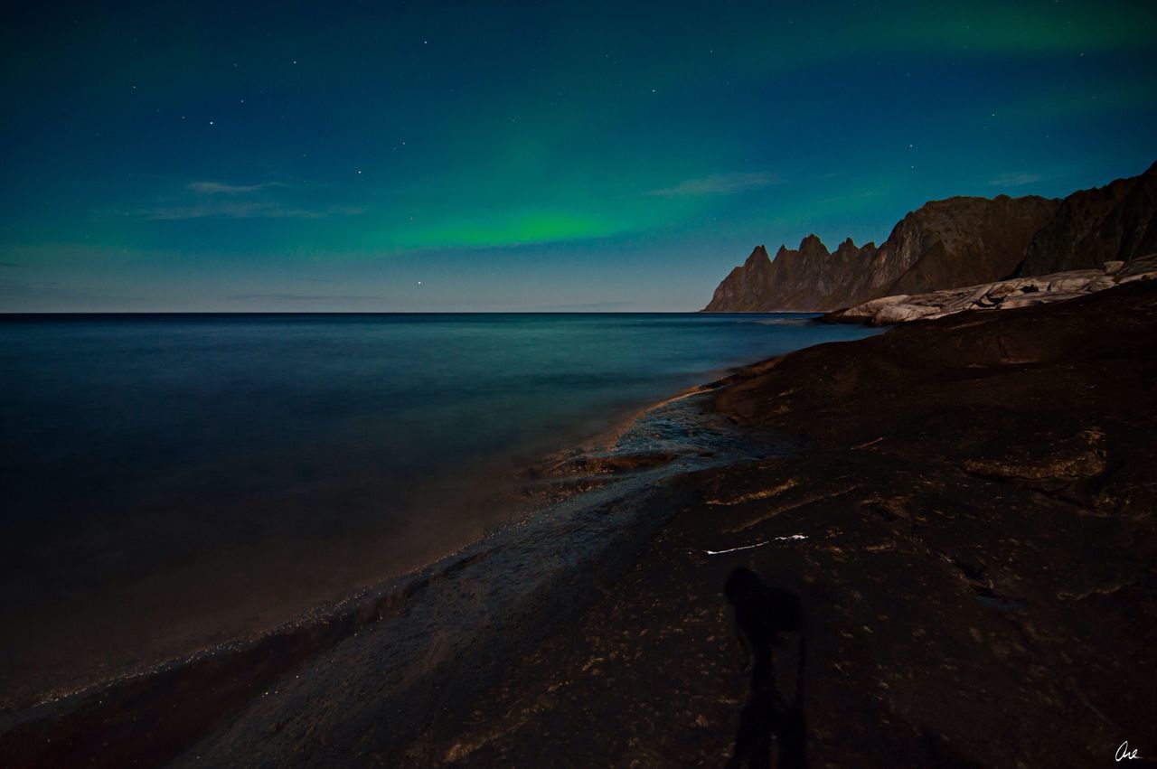 sea, scenics, water, horizon over water, tranquil scene, beauty in nature, tranquility, beach, sky, nature, blue, shore, coastline, mountain, idyllic, remote, non-urban scene, outdoors, calm, seascape