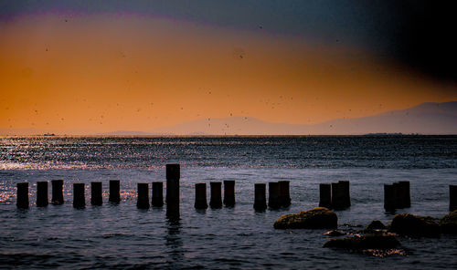 Scenic view of sea against sky during sunset