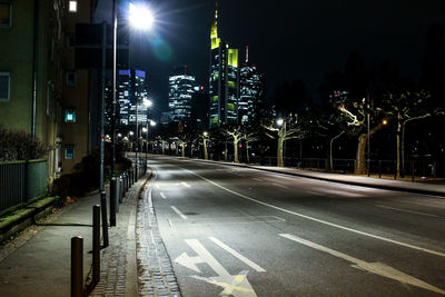 Illuminated light trails on road at night