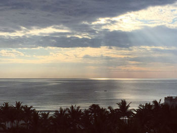 Scenic view of sea against sky at sunset