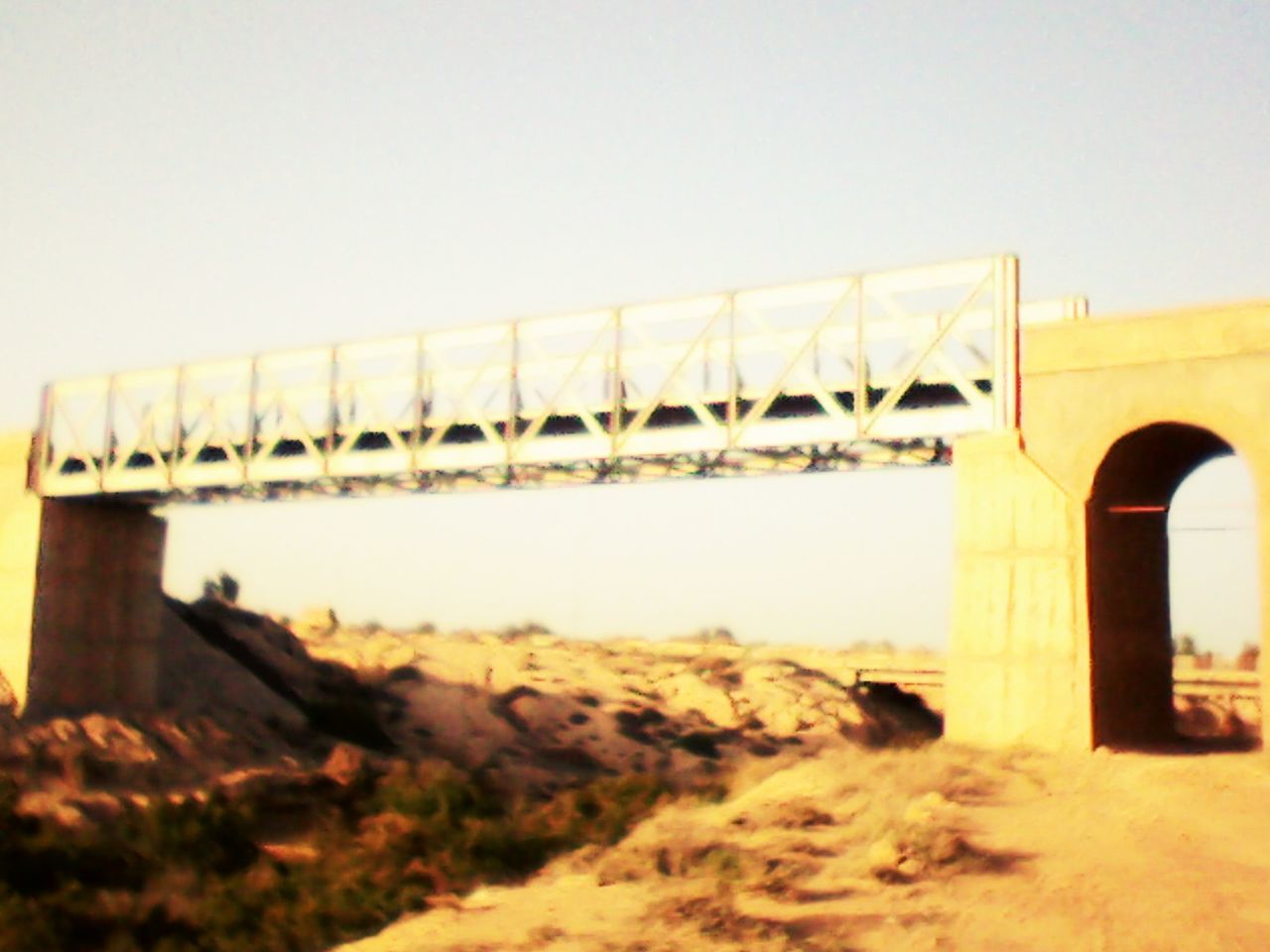 bridge - man made structure, architecture, connection, built structure, transportation, clear sky, arch, outdoors, day, no people, bridge, sky, building exterior, nature