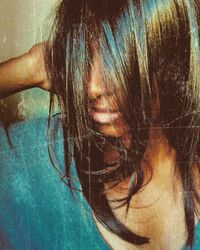 Close-up portrait of a girl in swimming pool