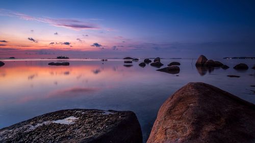 Scenic view of sea at sunset