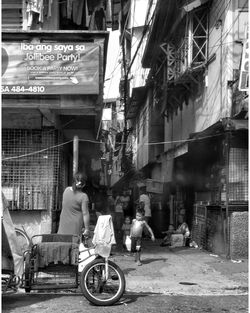 Rear view of man walking on street