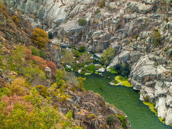 View of river passing through cliff