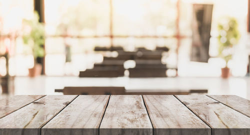 Close-up of empty bench on table