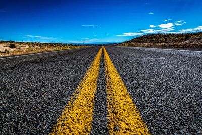 Road against blue sky