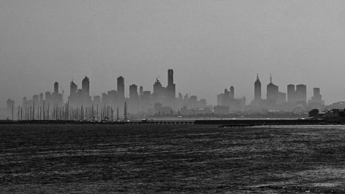 View of cityscape against clear sky