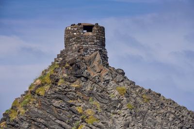 Low angle view of mountain against sky