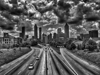 City street against cloudy sky