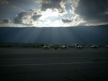 View of road against cloudy sky