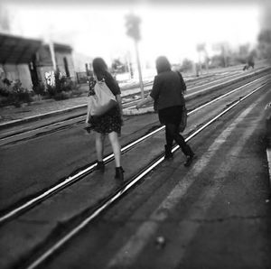 Full length of woman walking on street