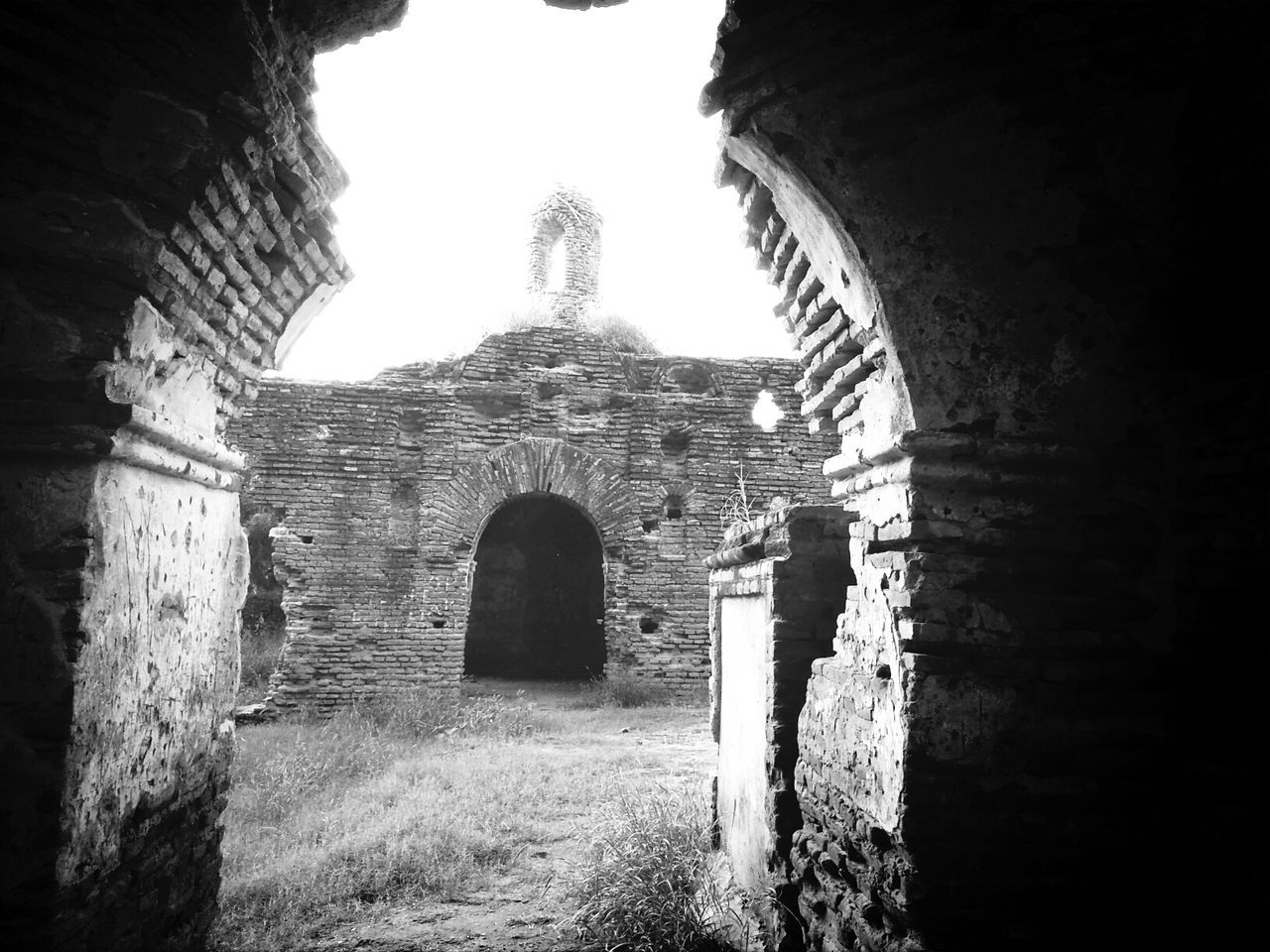 architecture, built structure, arch, history, building exterior, old ruin, old, the past, religion, ancient, clear sky, place of worship, stone wall, spirituality, abandoned, sky, damaged, church, low angle view