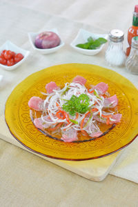 High angle view of fruits in plate on table