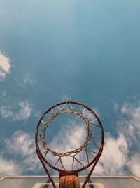 Low angle view of basketball hoop against sky