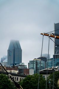 Modern cityscape against sky