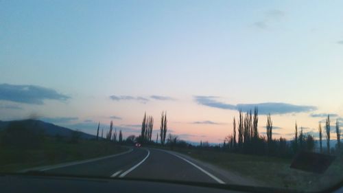 Country road passing through landscape