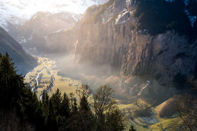 Scenic view of snowcapped mountains during winter