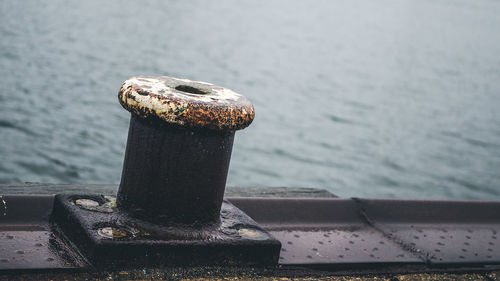 Close-up of rusty metal on boat