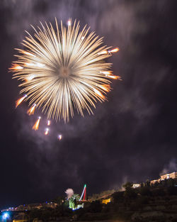Low angle view of firework display