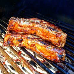 Close-up of meat on barbecue grill