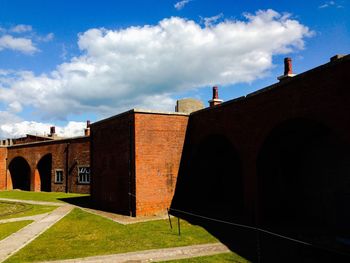 View of historic building against cloudy sky