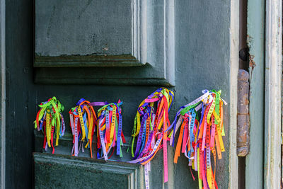 Famous ribbons of our lord of bonfim tied to the door of the church in salvador, bahia