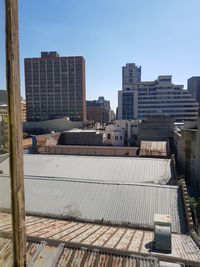 Modern buildings against sky in city