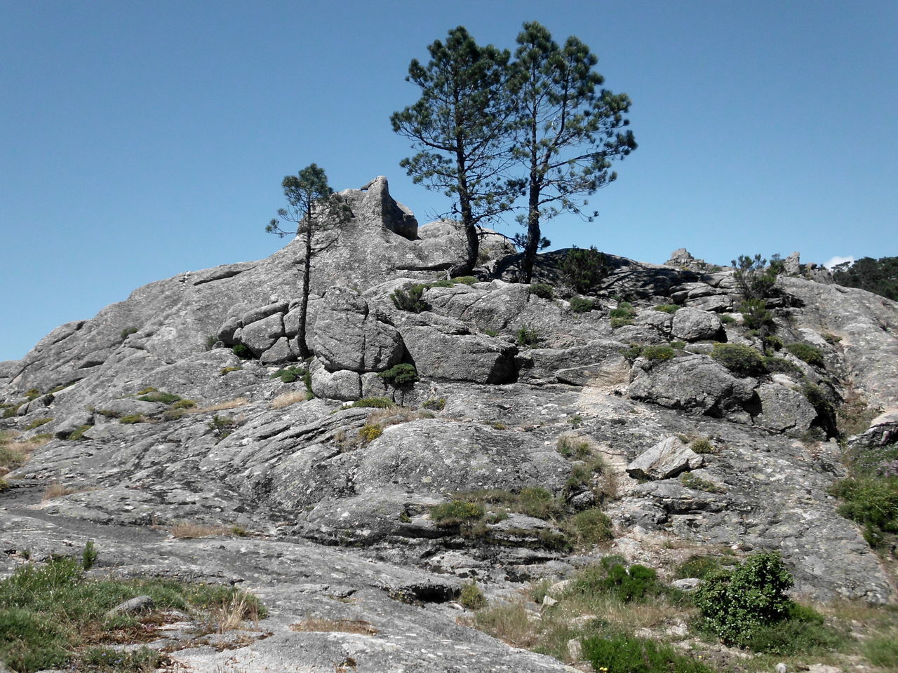 LOW ANGLE VIEW OF ROCK FORMATION AGAINST SKY