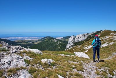 Senior woman hiking in velebit mountain, croatia