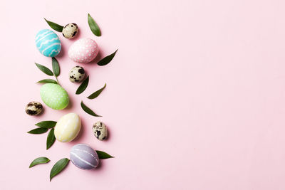 Close-up of fruits against pink background