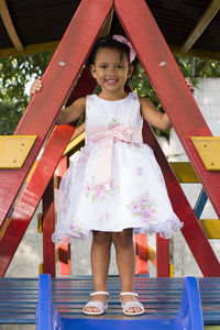 Full length portrait of happy girl
