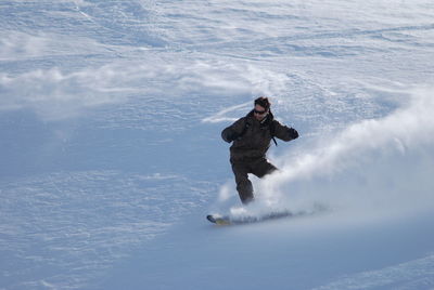 Man snowboarding