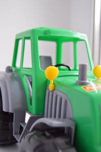 Close-up of green toy on table