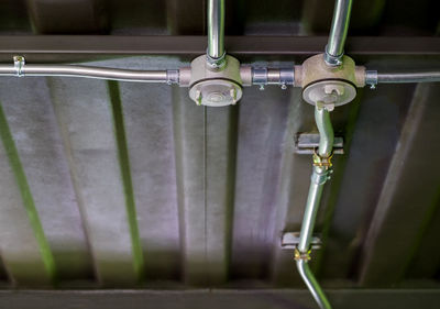 Close-up of faucet in bathroom