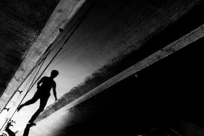 Shadow of running person