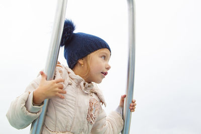 Cute girl playing outdoors during day