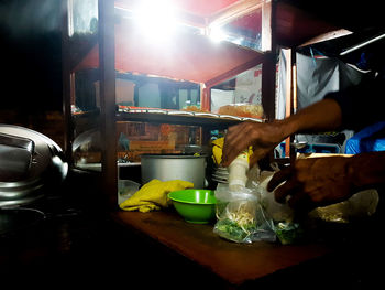 Man preparing food in kitchen