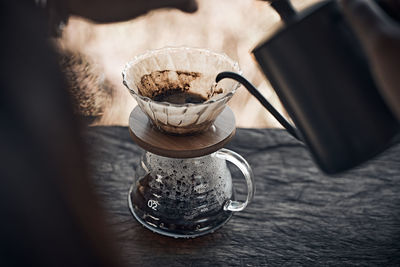 High angle view of coffee cup on table