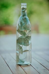 Close-up of drink in glass jar on table