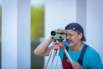 Man photographing with camera