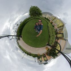 People in traditional clothing against sky