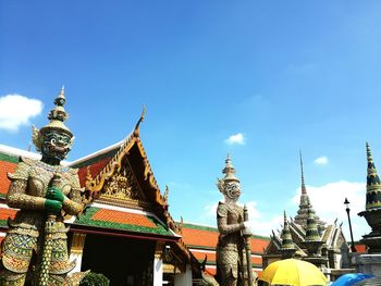 Statues against the temple