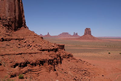 Rock formations in desert against sky